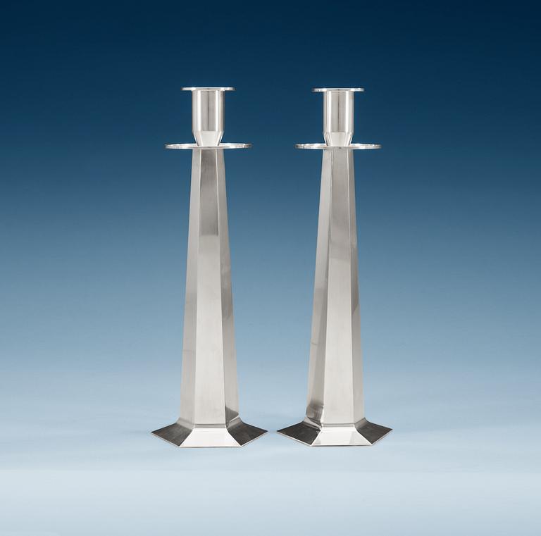 A pair of Wiwen Nilsson sterling candle sticks, Lund 1952 -56.