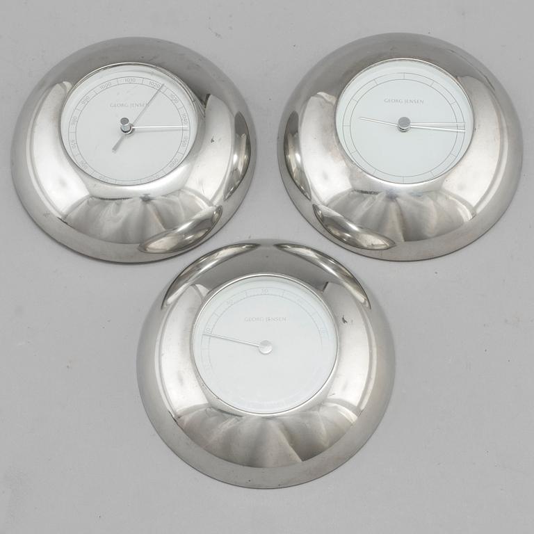 A wall clock, barometer and hydrometer, by Andreas Mikkelsen for Georg Jensen.