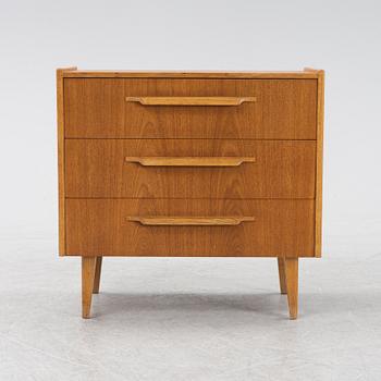 A teak veneered chest of drawers, Häggeryda Möbelfabrik, Nilsson & Co, Glimåkra, 1950's/60's.