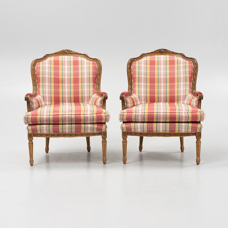A pair of Louis XVI-style armchairs, second half of the 20th Century.