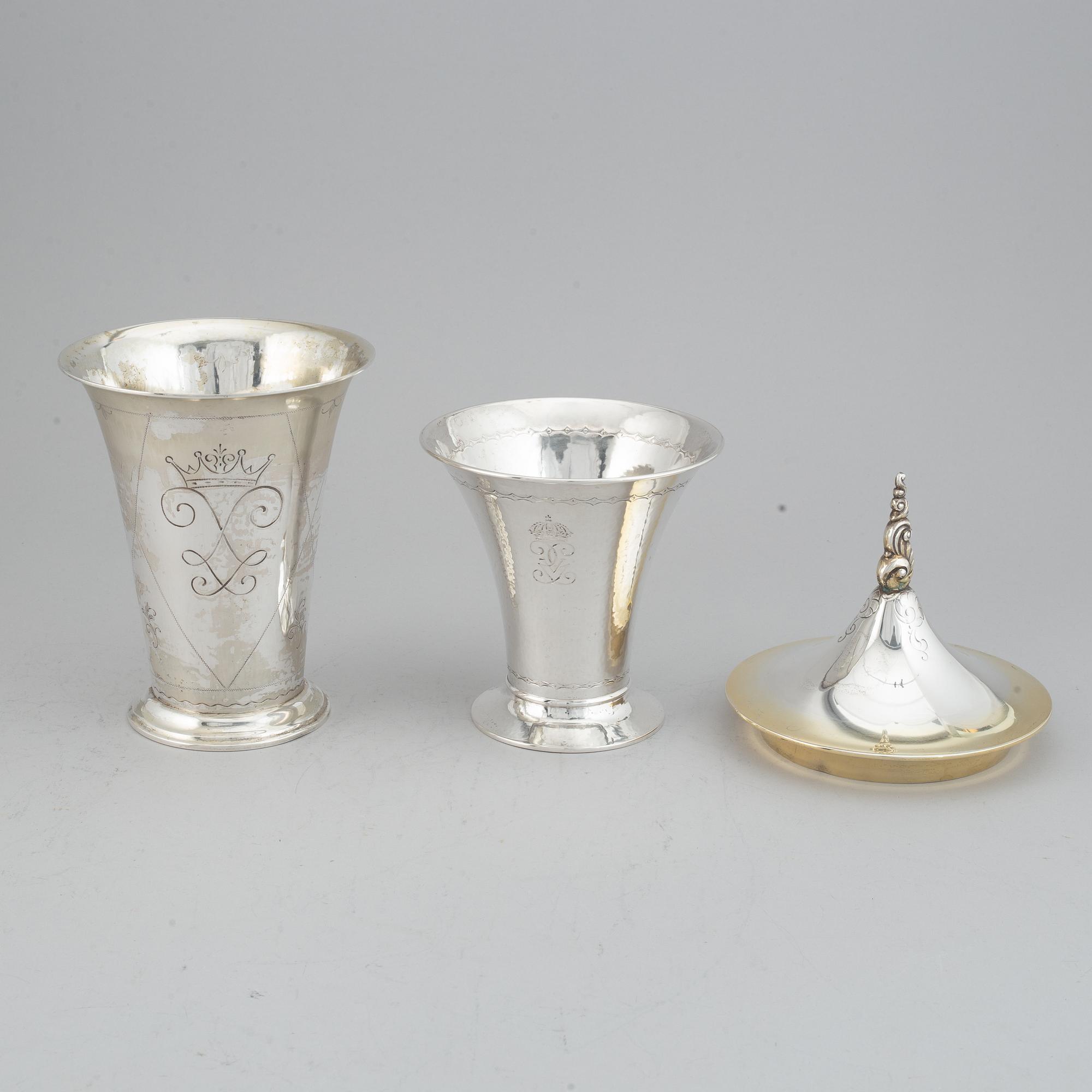 Two silver and parcel-gilt beakers and a parcel-gilt lid, maker's mark K. Andersson, Stockholm, 1927, 1922 and 1948.