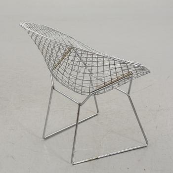 A HARRY BERTOIA "DIAMOND CHAIR".
