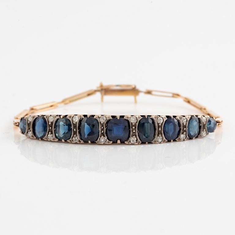 Bracelet 14K gold with dark sapphires and old-cut diamonds.