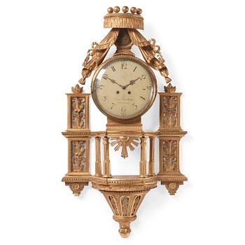 A late Gustavian giltwood cartel clock by E. Rundelius (watchmaker in Stockholm 1793-1815).