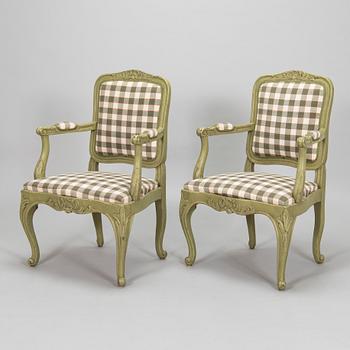 A pair of 20th century  Rococo style armchairs.