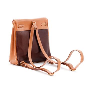 HERMÈS, a calf leather and brown Amazonia leather backpack, "Kelly Ado Backpack":.