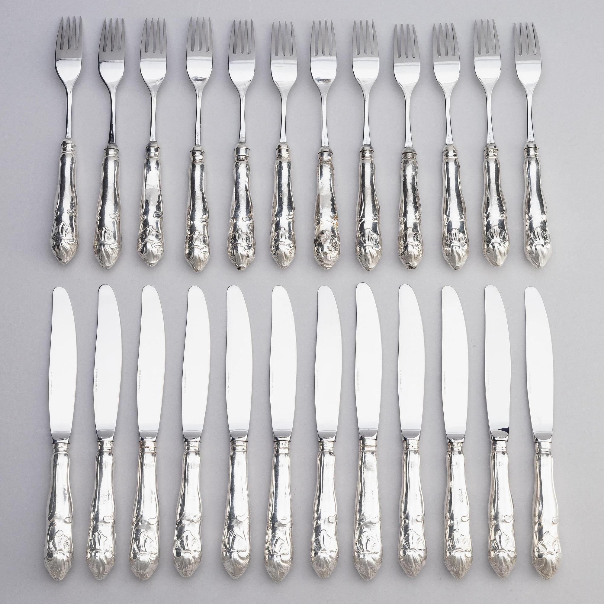 A Swedish set of 24 piece silver table-cutlery, marks of  Isak Trybom, Stockholm 1766-1783.