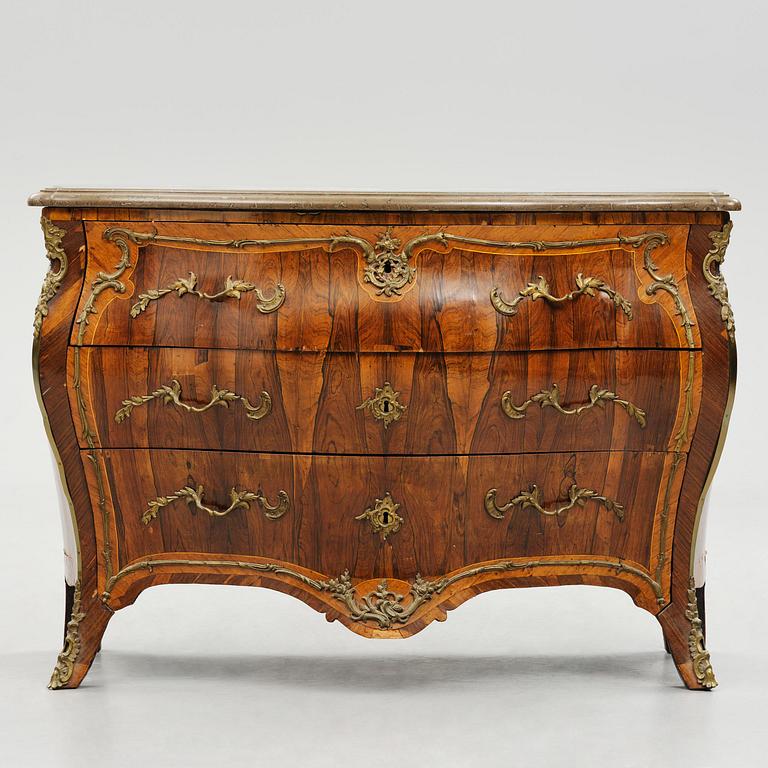 A rococo parquetry commode by C. G. Willkom (master in Stockholm 1763-65).