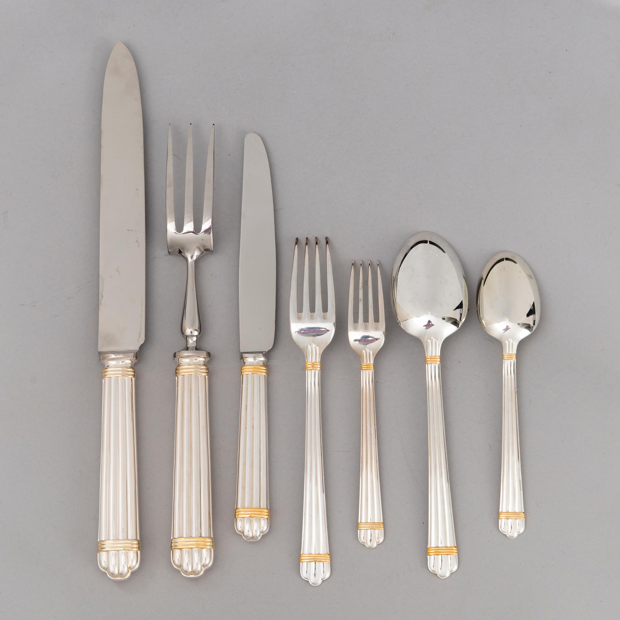 CHRISTOFLE 123-piece Aria Gold Ring Silver Plated Cutlery Set for Twelve persons.