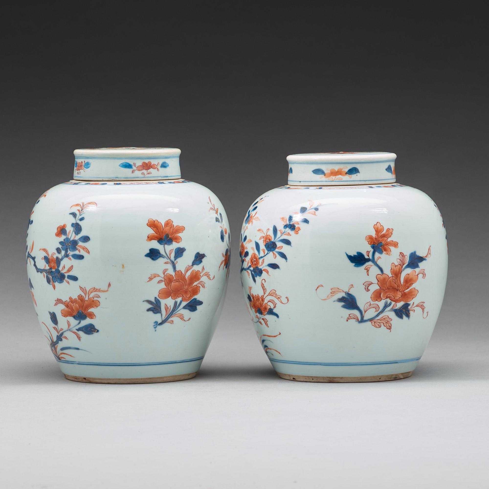 A pair of imari jars with covers, Qing dynasty, 18th Century.