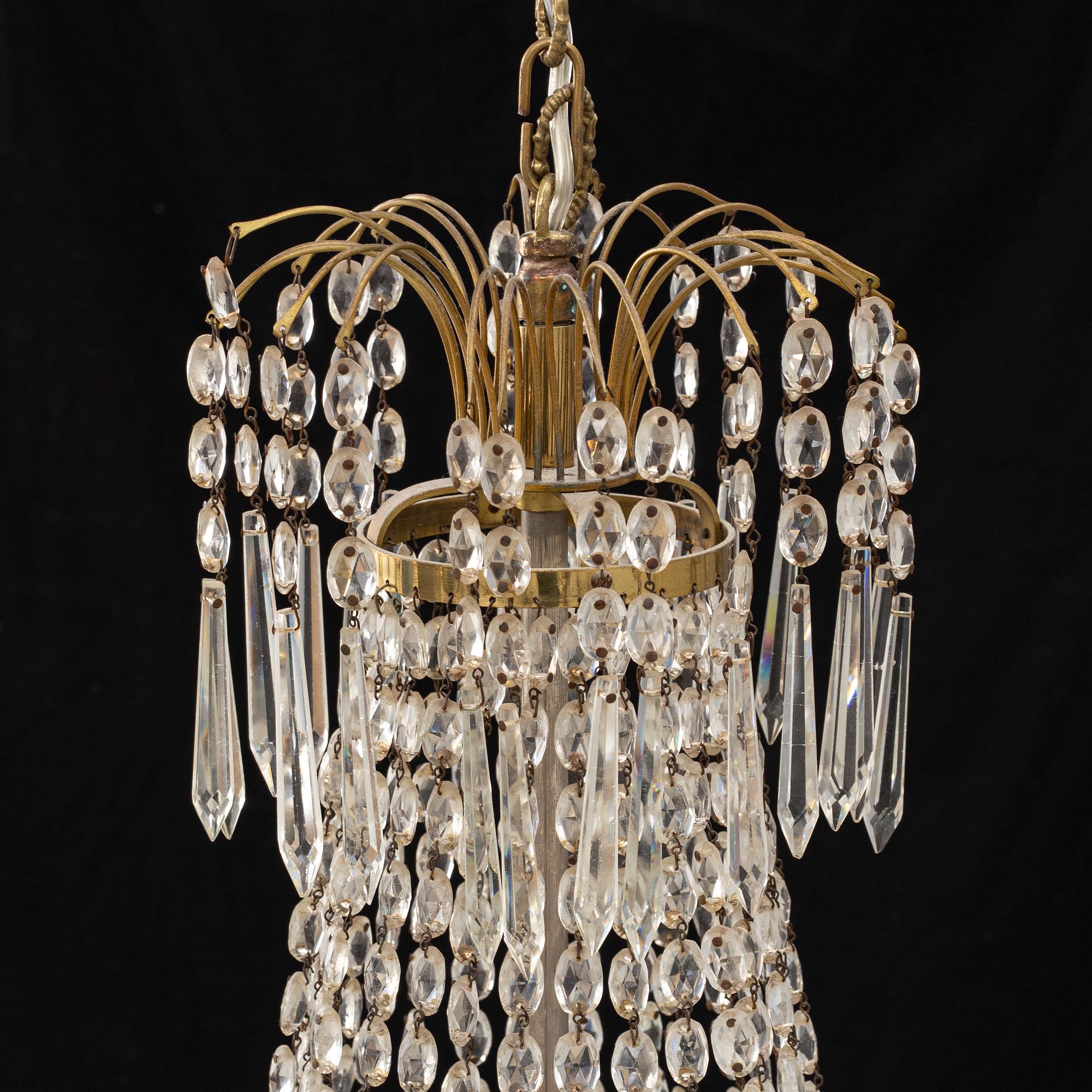 An Empire style chandelier, early 20th century.