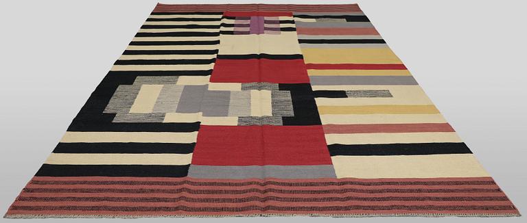 A Kilim carpet, c. 306 x 200 cm.