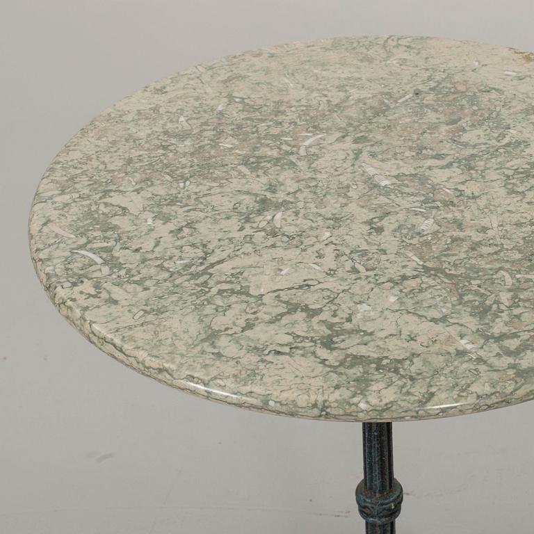 A IRON GARDEN TABLE.