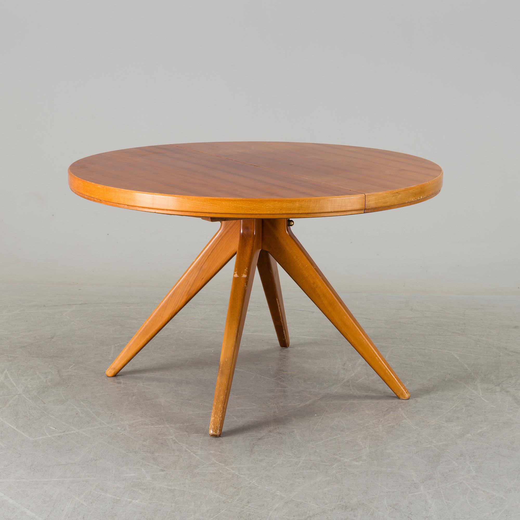 A David Rosén dining table, model "570-025", Nordiska kompaniet. 1950s.