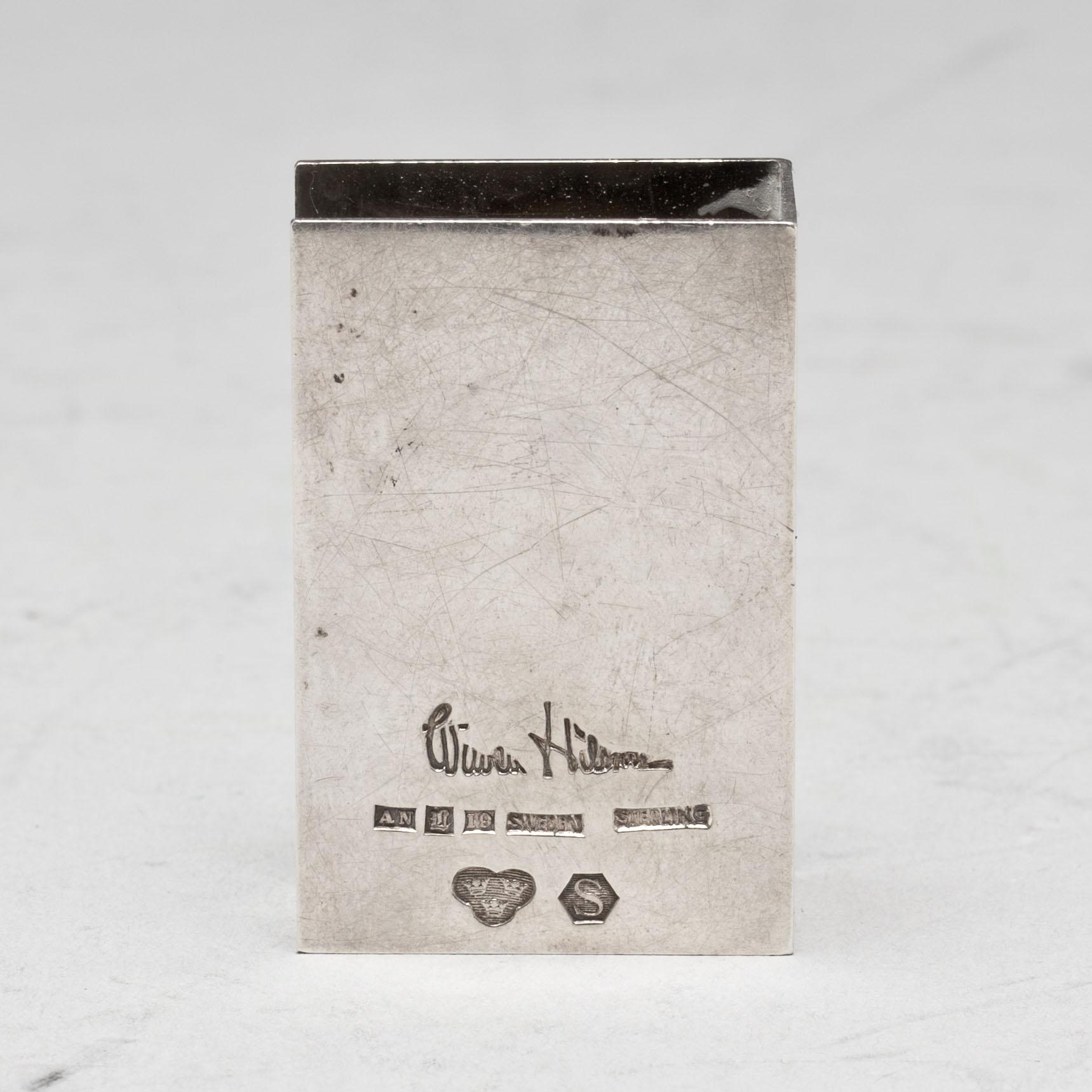 TÄNDSTICKSASKSHÅLLARE, sterlingsilver. Wiwen Nilsson. Lund, 1959. Vikt ca 22g.