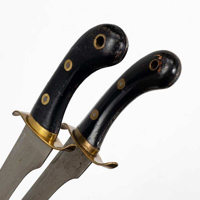 Two Swedish cutlasses 1848 pattern,with scabbards.