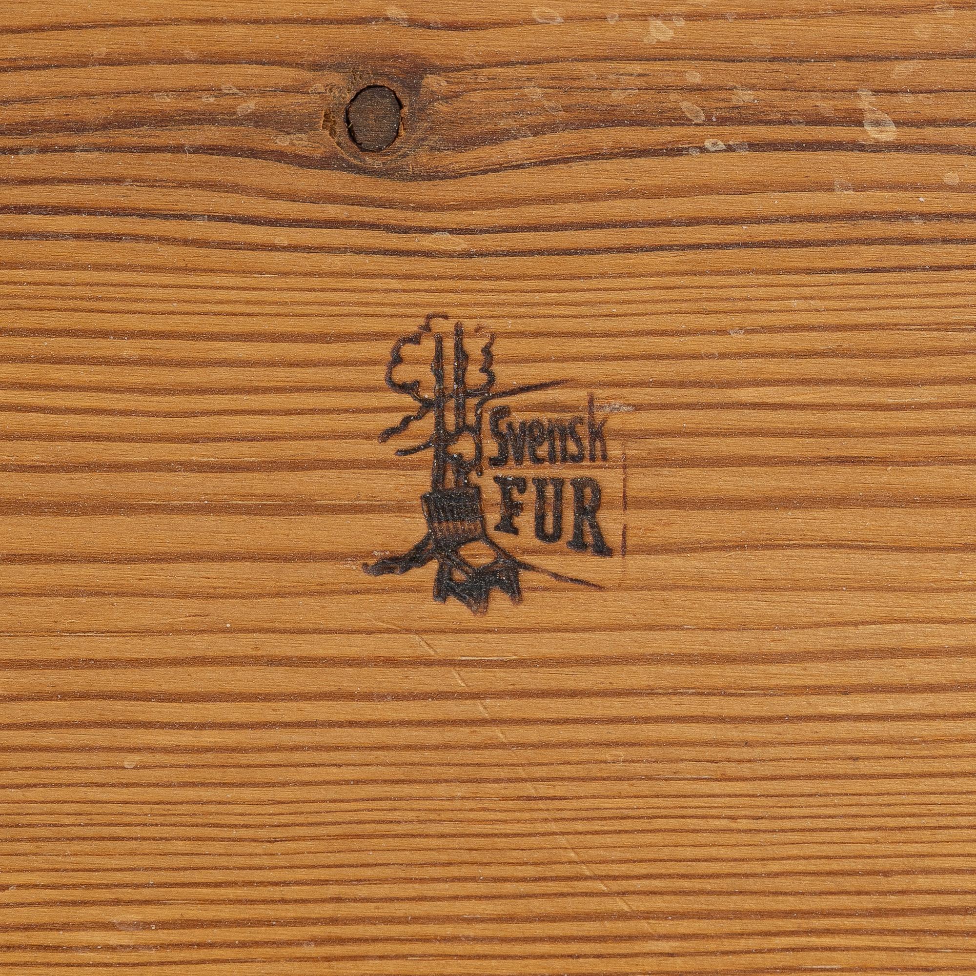 Carl Malmsten, a drop-leaf table, "Vapensmeden", second half of the 20th century.