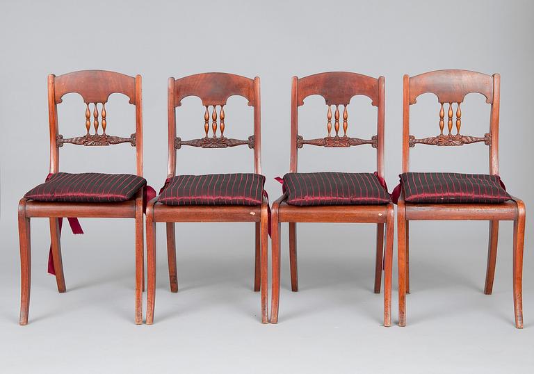 A SET OF FOUR CHAIRS.