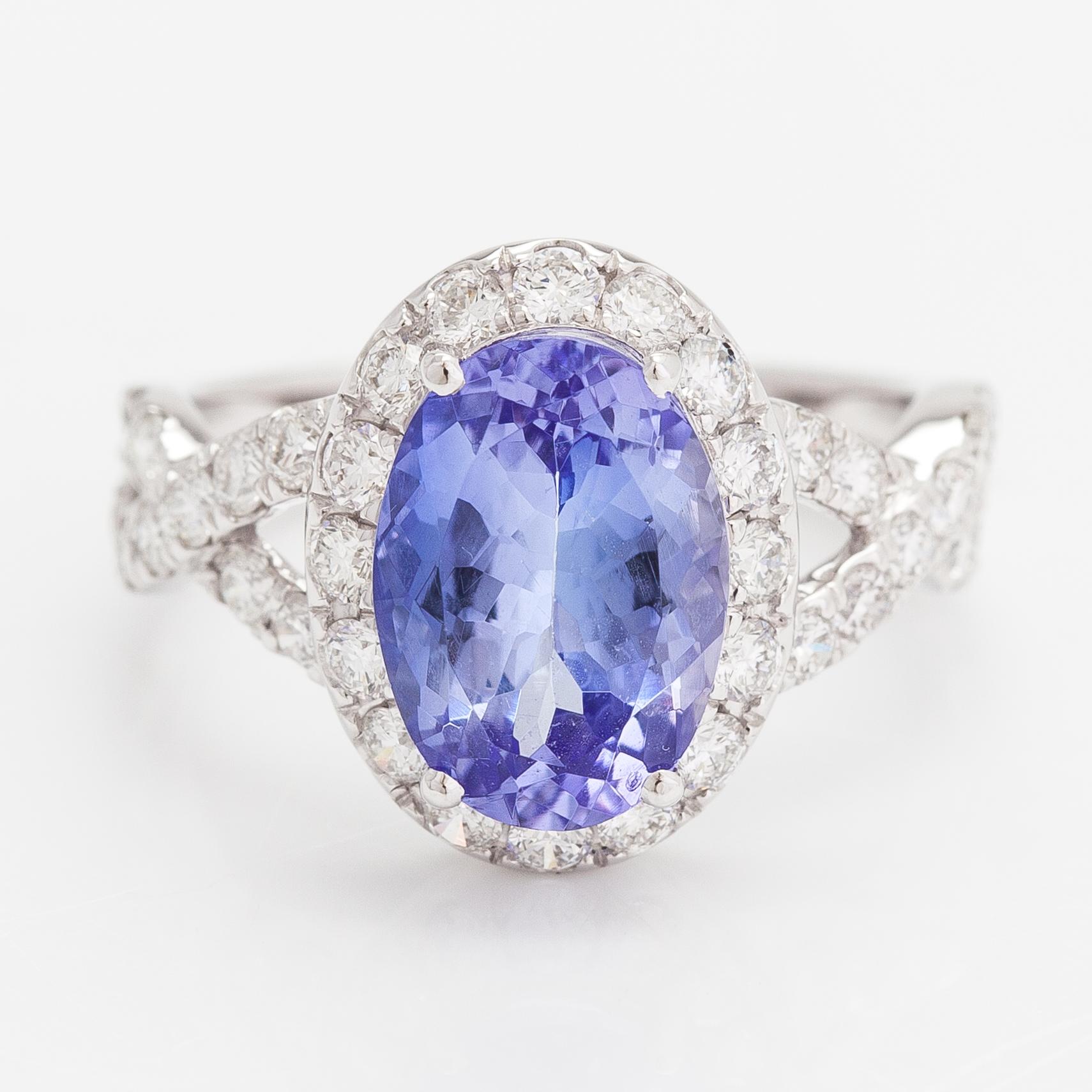 An 18K white gold ring with a ca. 3.45 ct tanzanite and diamonds ca 1.53 ct in total. IGI certificate.