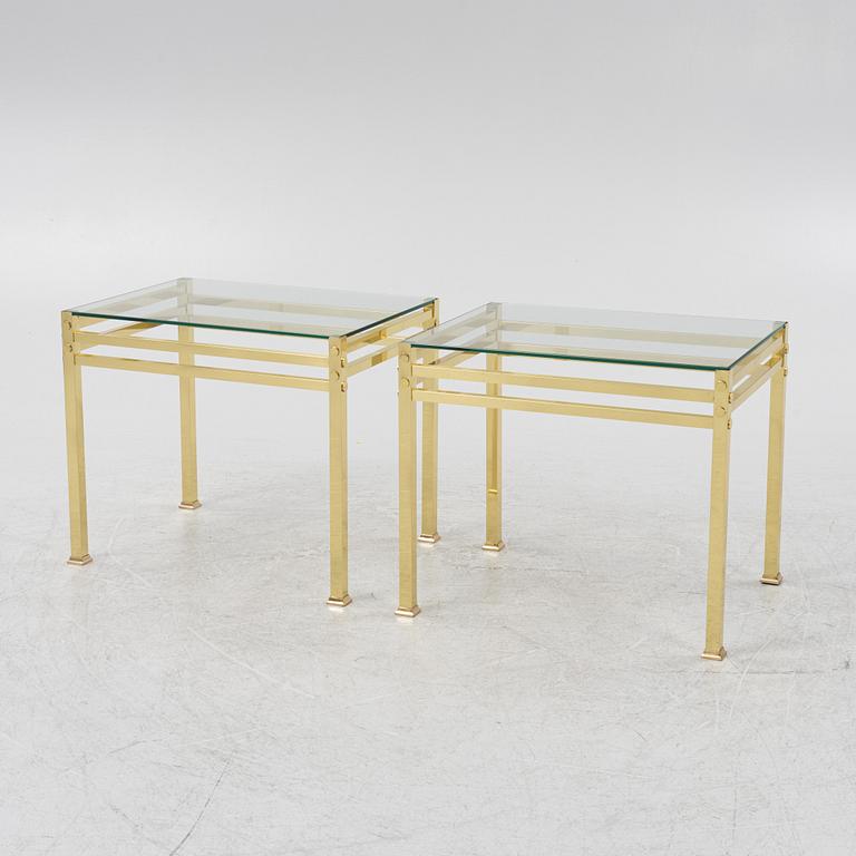 A pair of glass top bedside tables, second half of the 20th century.