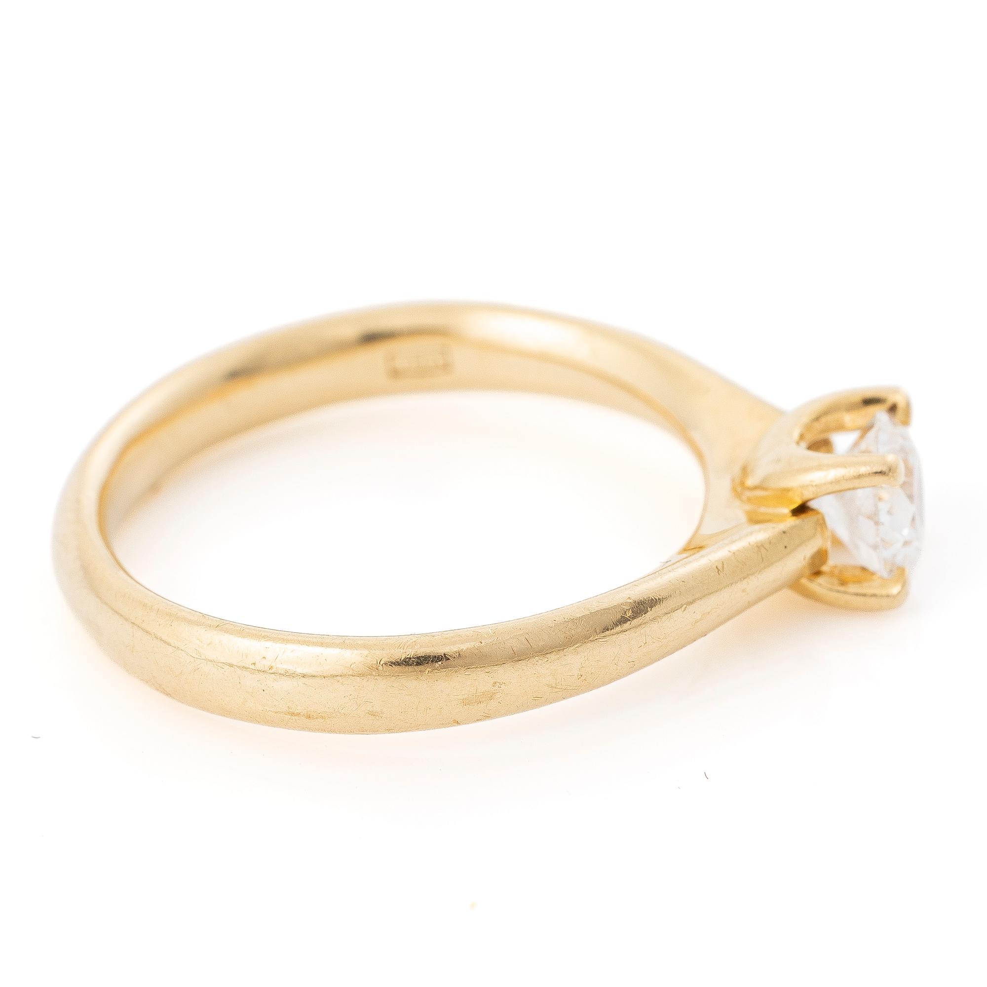 Ring, 18K gold with a brilliant-cut diamond.