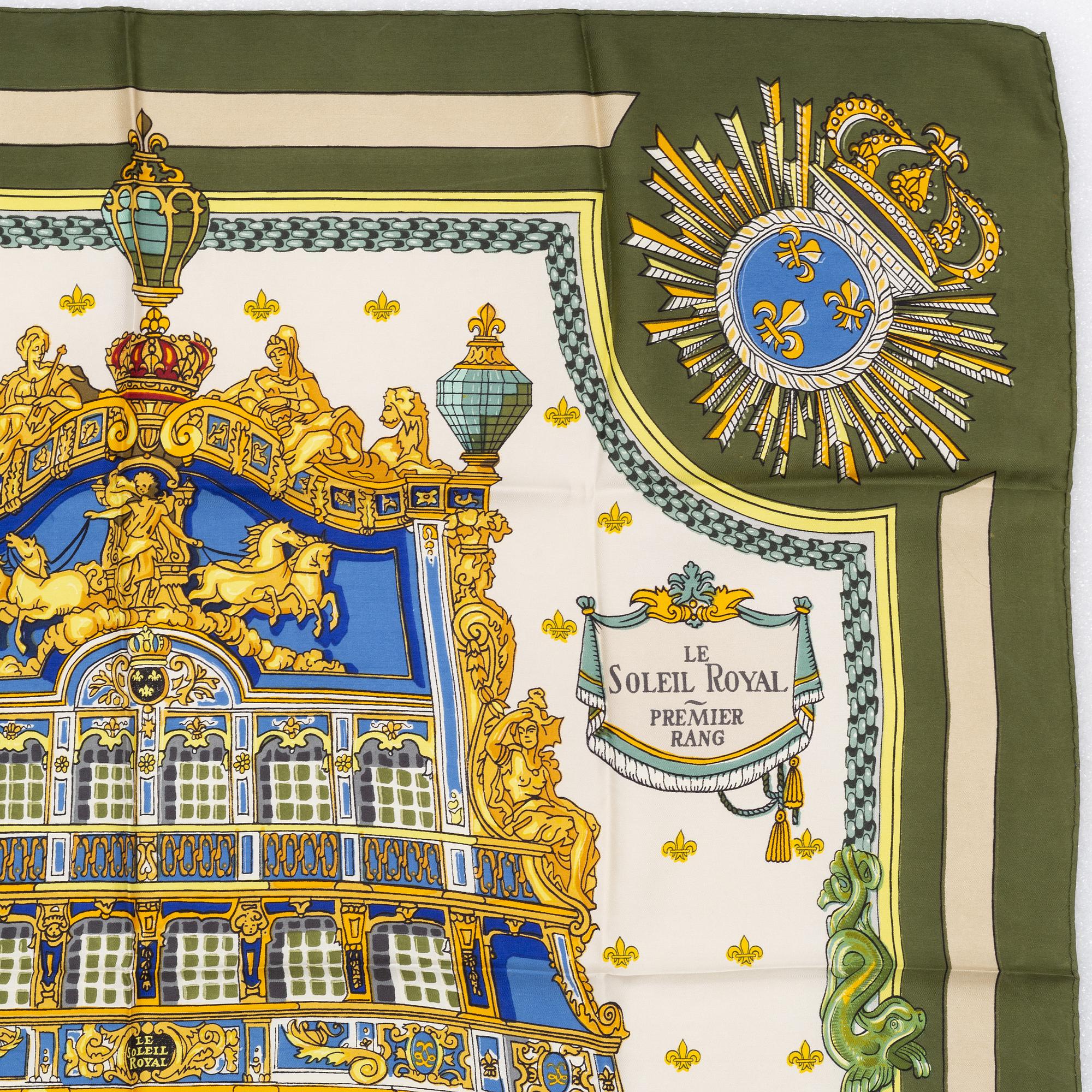 Hermès, a 'Le Soleil Royal' silk scarf.