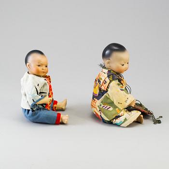 Two oriental bisque head baby dolls by Armand Marseille and Heubach Köppelsdorf, Germany, early 20th century.