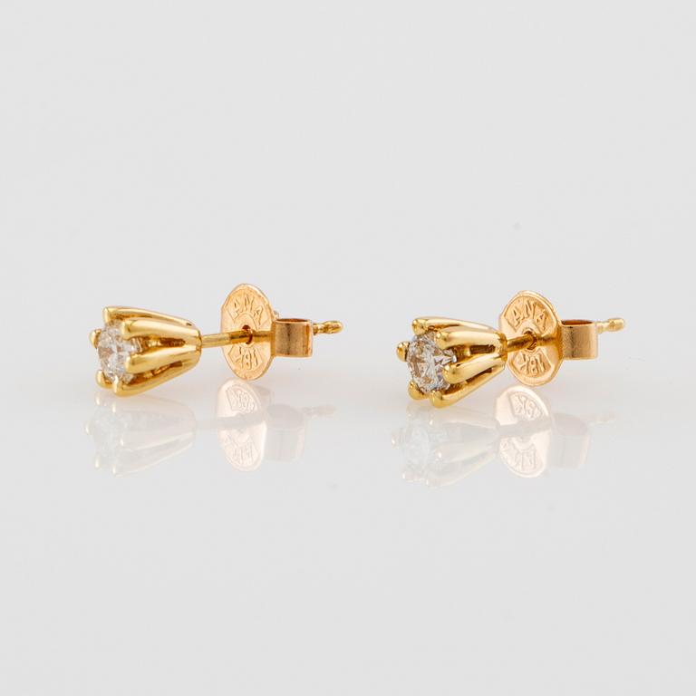 Earrings, a pair of 18K gold with diamonds approx. 0.32 ct in total.