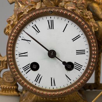 Late 19th century French figural gilt clock features a shepherd to the top of the clock with a lamb. Marked Brunfaut 76".