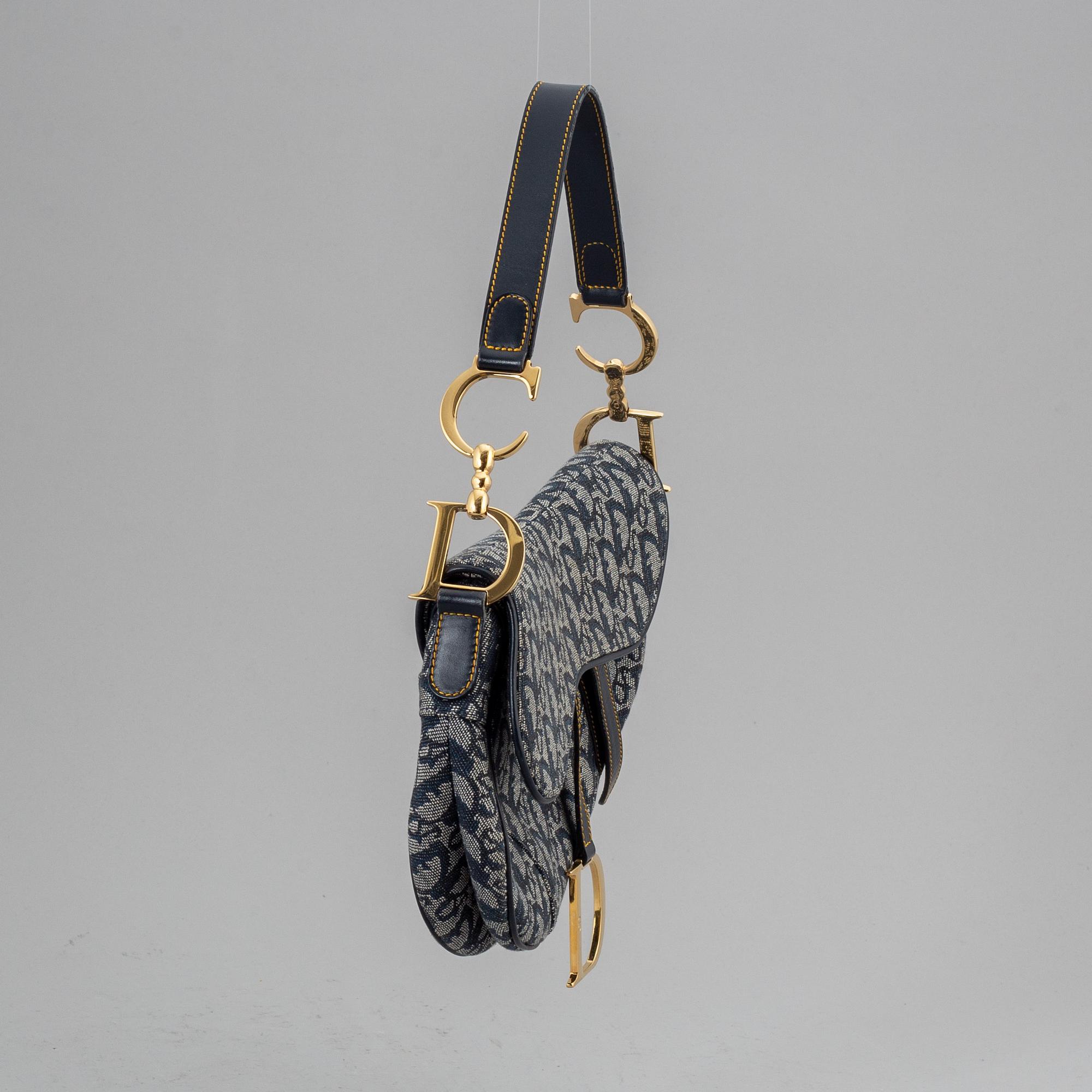 CHRISTIAN DIOR, a vintage mpnpgram canvas 'Saddle Bag!.