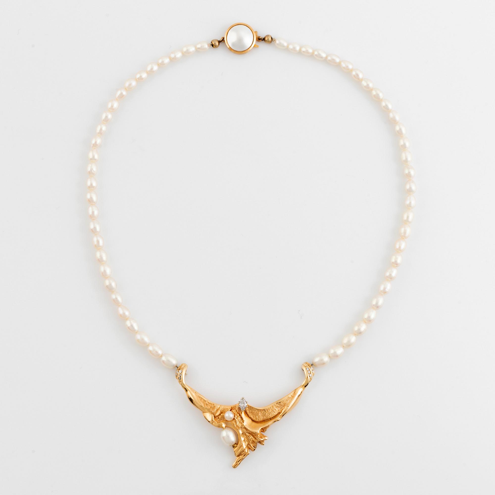 Cultured freshwater pearl necklace, with navette cut diamond and brilliant cut diamonds.
