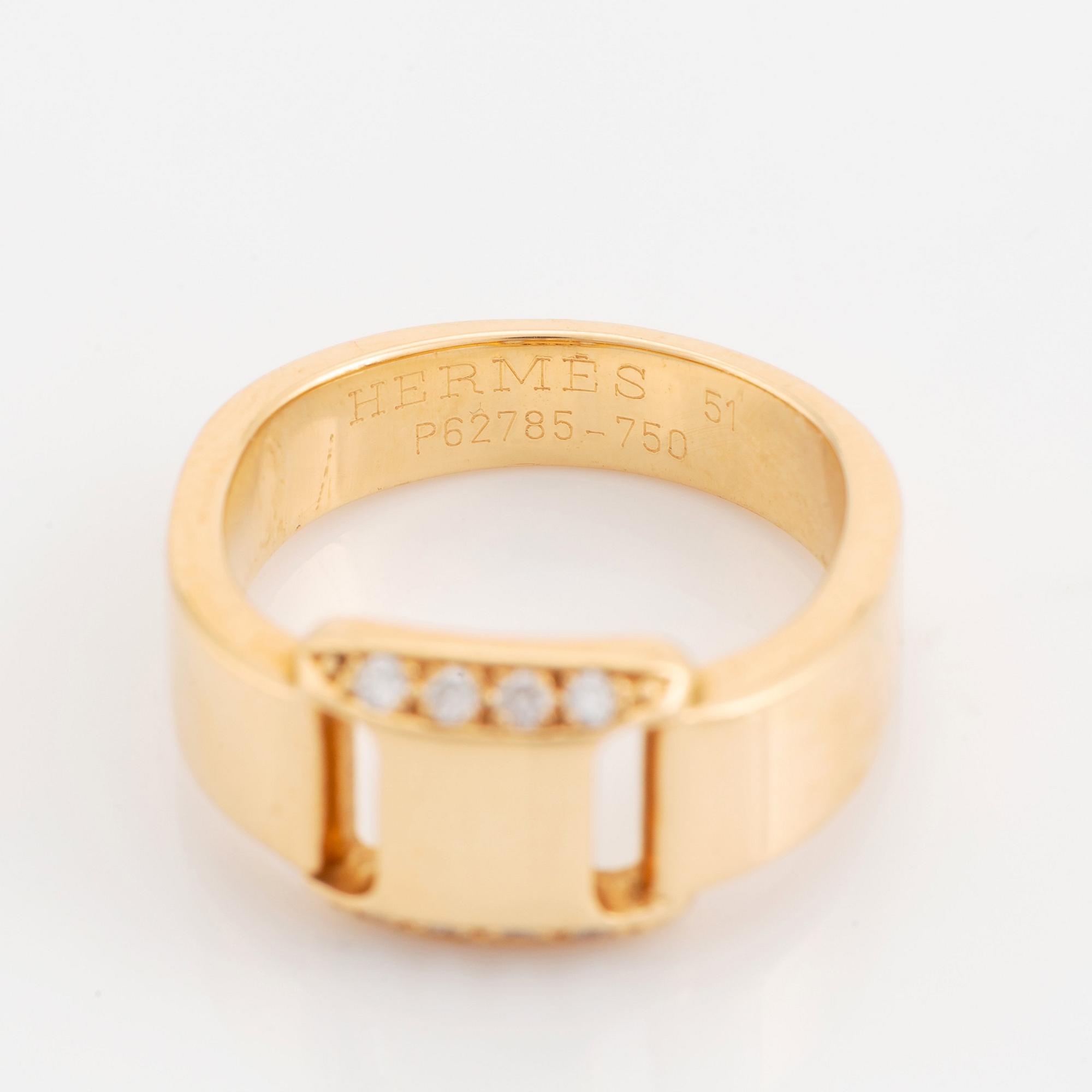 Hermès ring 18K guld med runda briljantslipade diamanter.
