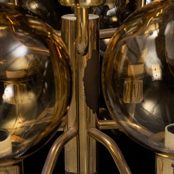 Hans-Agne Jakobsson, a late 20th century brass and glass ceiling lamp for nine lights, Markaryd, Sweden.