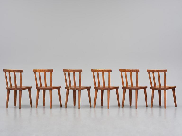 Axel Einar Hjorth, a set of six stained pine "Utö" chairs, Nordiska Kompaniet, Sweden, 1930s.