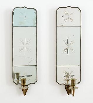 412. A pair of Swedish one light girandole mirrors.