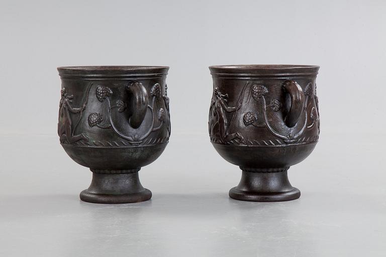 Ivar Johnsson, a pair of Swedish Grace cast iron jardinières, 'Diana' by Näfveqvarn, Sweden 1920's.