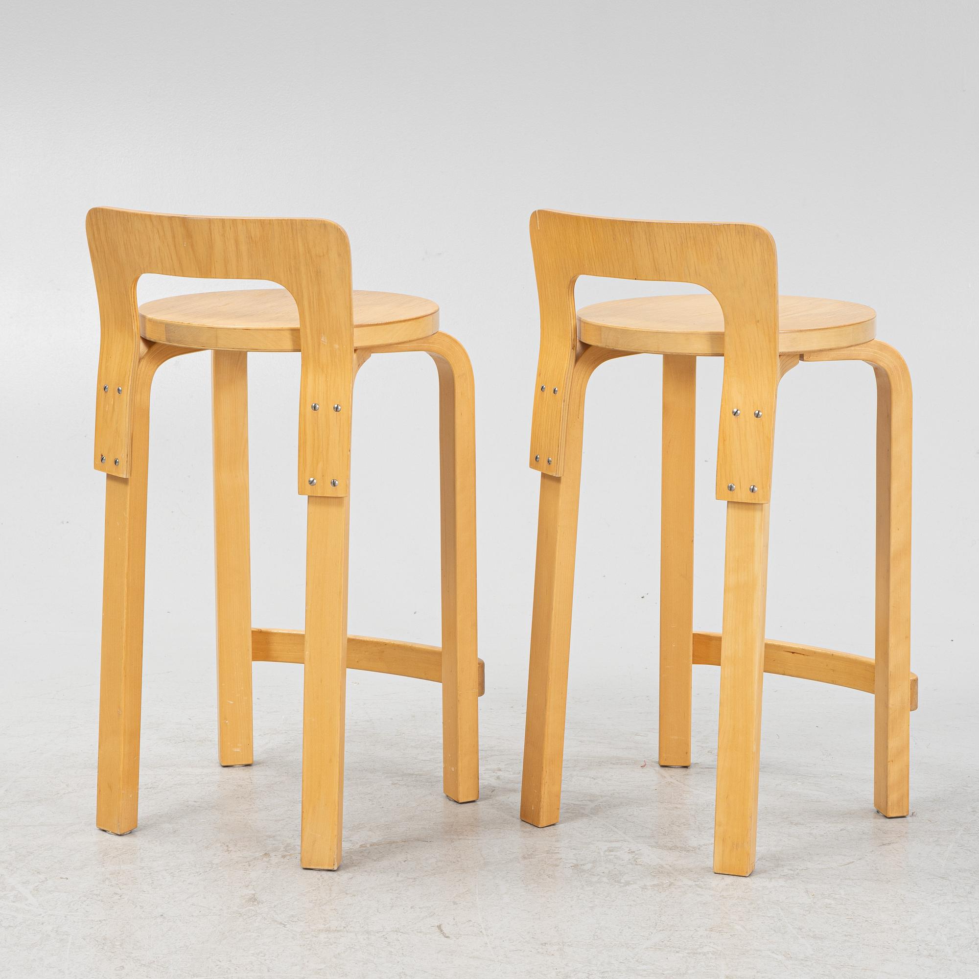 Alvar Aalto, a pair of model 'K65' birch bar chairs, Artek, Finland.