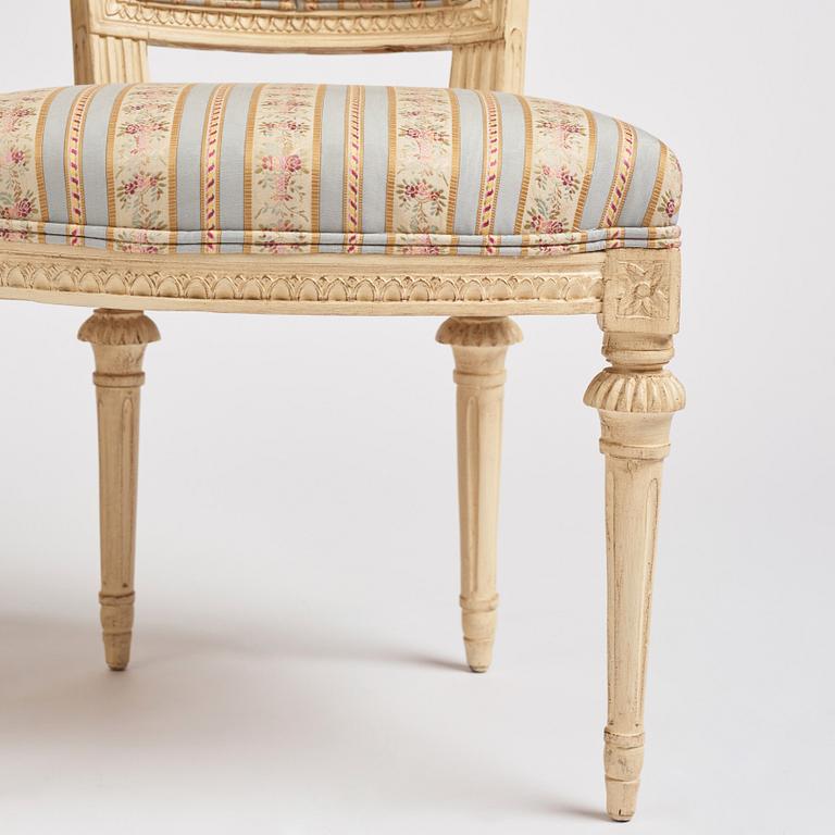 A set of nine Gustavian chairs by A Hellman (master in Stockholm 1761-94) and E Ståhl (master in Stockholm 1794-1820).