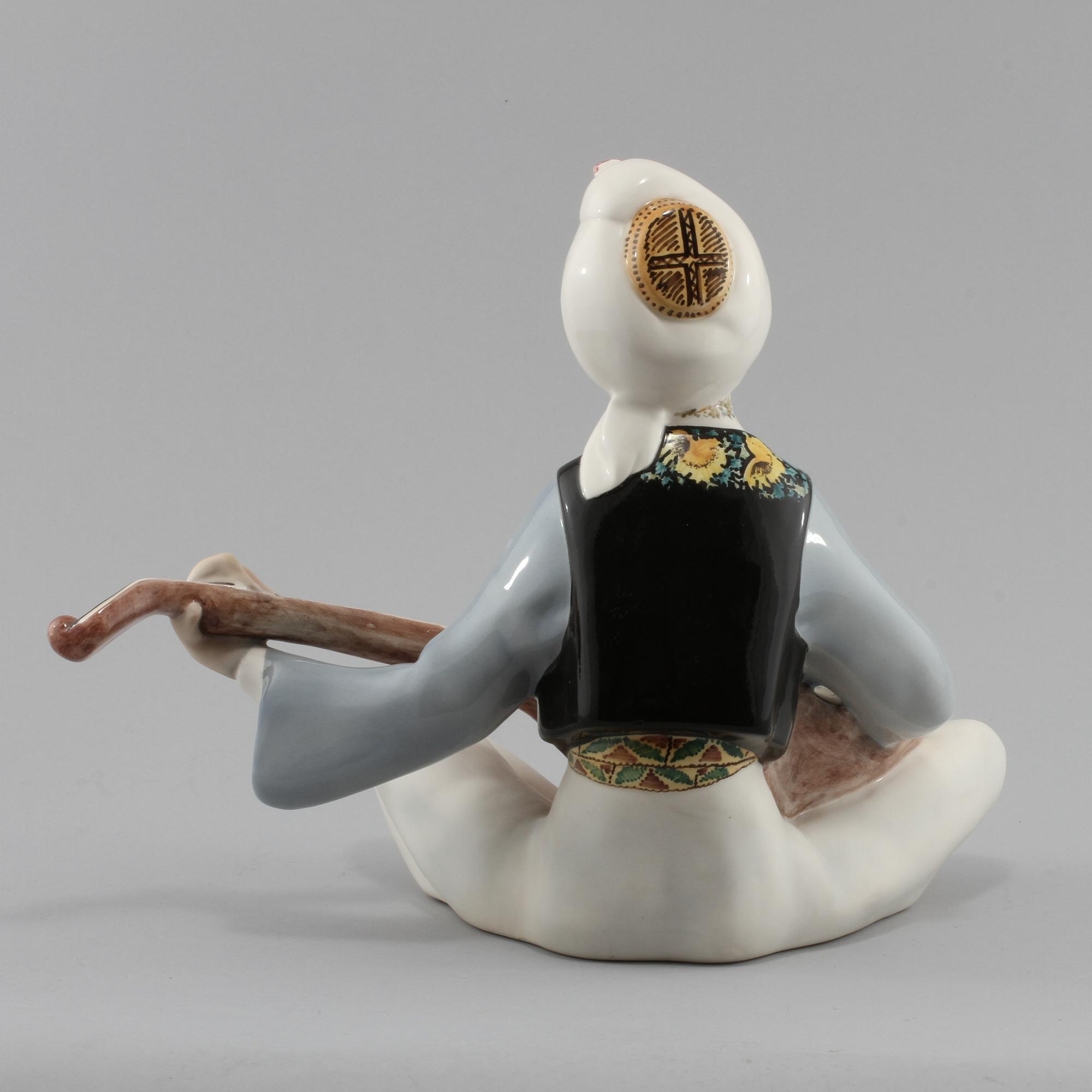 FIGURIN, porslin, Torino, Italien, 1900-talets andra hälft.