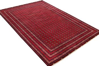 An Afghan carpet, c. 292 x 200 cm.