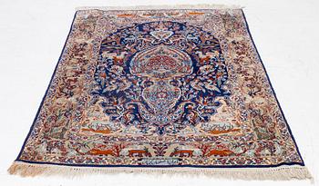 An oriental, figural, signed rug, c. 162 x 104 cm.