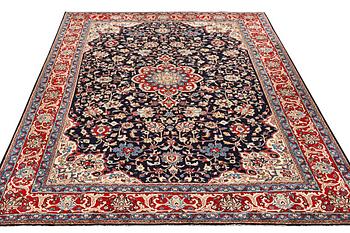 A carpet, Mashad, c. 386 x 259 cm.