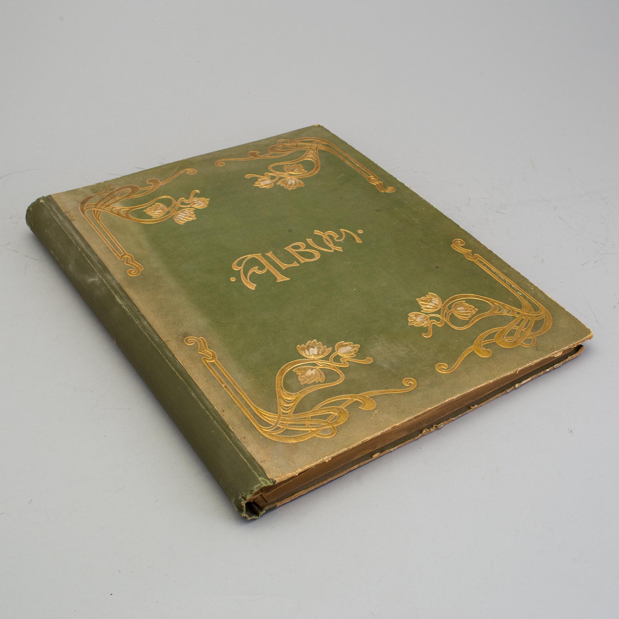 An early 20th century album with paper bookmarks.