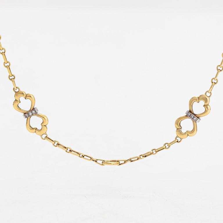 An 18K gold necklace, with diamonds totalling approx. 0.12 ct. Foreign hallmarks.