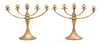 A pair of cast bronze candelabra, attributed to K M Seifert & Co, Dresden-Löbtau ca 1910-15.