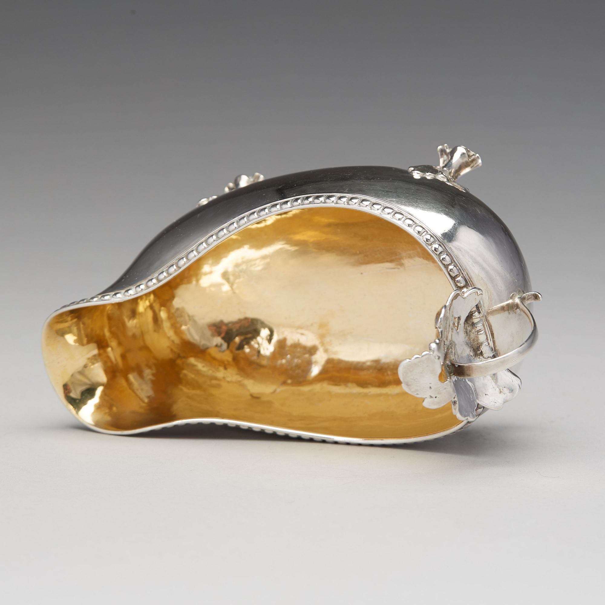 A Swedish Rococo parcel-gilt silver cream-jug, mark of Petter Åkerman, Stockholm 1778.