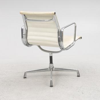 Charles & Ray Eames, an "EA 104 Swivel" chair, Vitra.