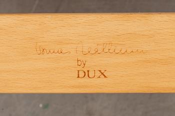 VILSTOLAR, ett par. "Eva", Bruno Mathsson, Dux, numrerad jubileumsutgåva 1994, brick- och stämpelmärkt.