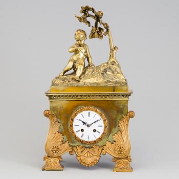 A mid 19th century pendulum table clock.