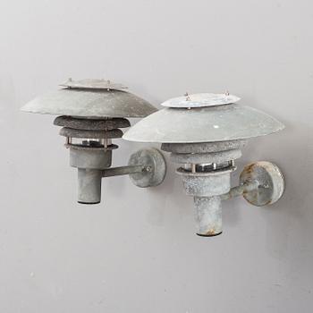 A pair of late 20th century outdoor lights.